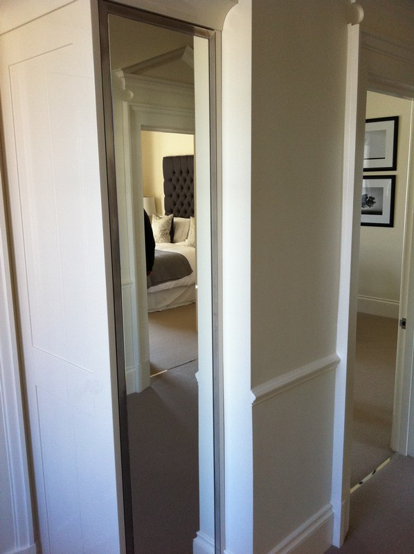 Full-length wardrobe mirror fitted in Lower Edmonton home