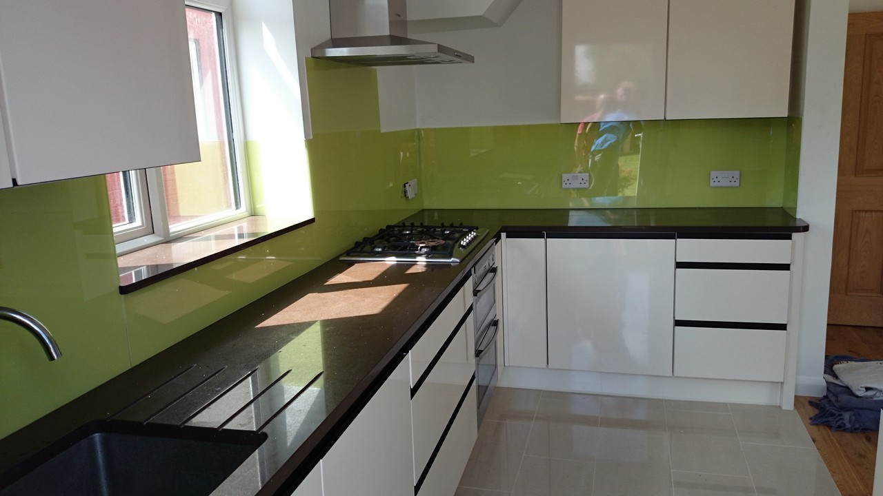 Lime green glass kitchen splashback installed by Lower Edmonton glaziers