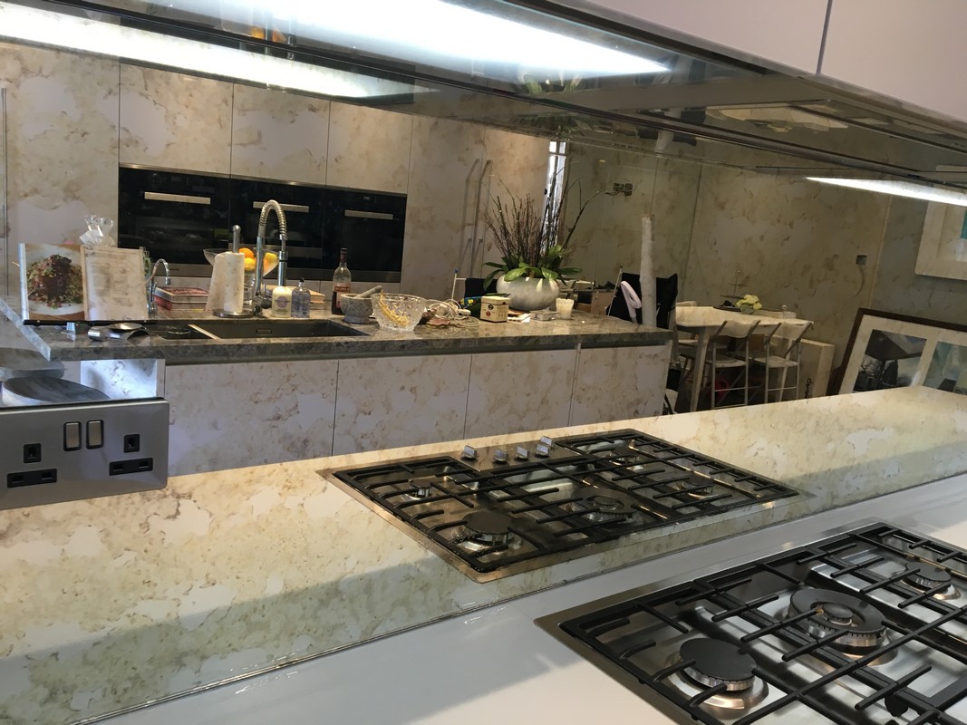 Mirror glass splashback in Lower Edmonton luxury kitchen